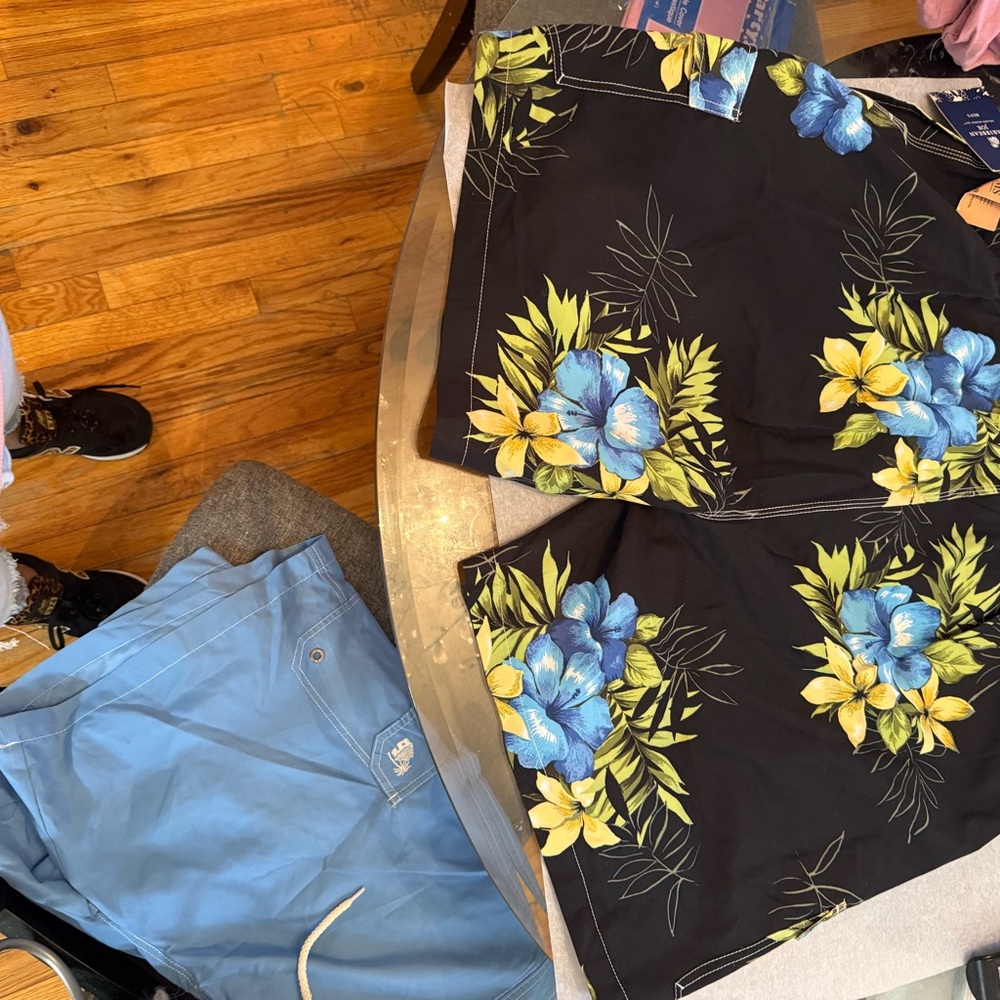 Black Hawaiian Floral Swim Trunks with Blue Accents